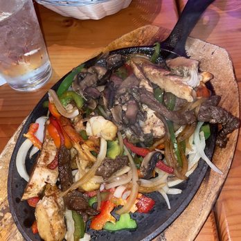 Tequila Sunrise signature dishes Mixed FajitasBaja Fish TacosAl Carbon TacosArugula Chicken Tacos